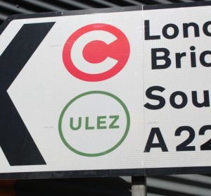 Congestion charge and ULEZ-symbols on London road sign