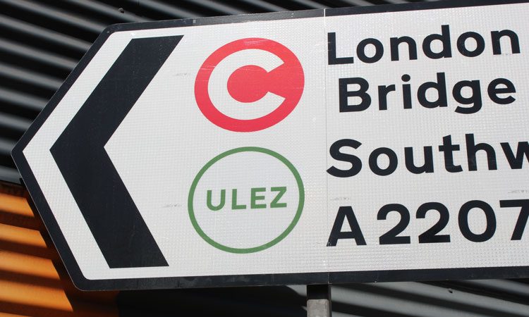 Congestion charge and ULEZ-symbols on London road sign