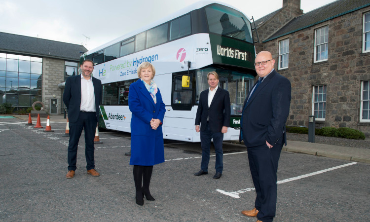 07/10/20 L-R Coucillor Douglas Lumsden, Councillor Jenny Laing, Jo Bamford, Wrightbus owner and Executive Chairman,David Phillips, Operations Director for First Aberdeen. The world’s first hydrogen-powered double decker bus was revealed today in Aberdeen which showcases the city as a trailblazer in hydrogen technologies.The arrival of the first bus in the city underlines the city’s role as the energy capital of Europe and shows its commitment to the transition of green energy from oil and gas as part of the Net Zero Vision.The hydrogen double deckers will be spotted around the city for several weeks during a period of final testing along with training for drivers, with the buses expected to be in service next month. The buses are as efficient as electric equivalents, with refuelling taking less than 10 minutes and offering a greater range. Water is the only emission from the vehicles which reduces carbon emissions and the new buses continues to contribute to the city’s commitment to tackling air pollution.