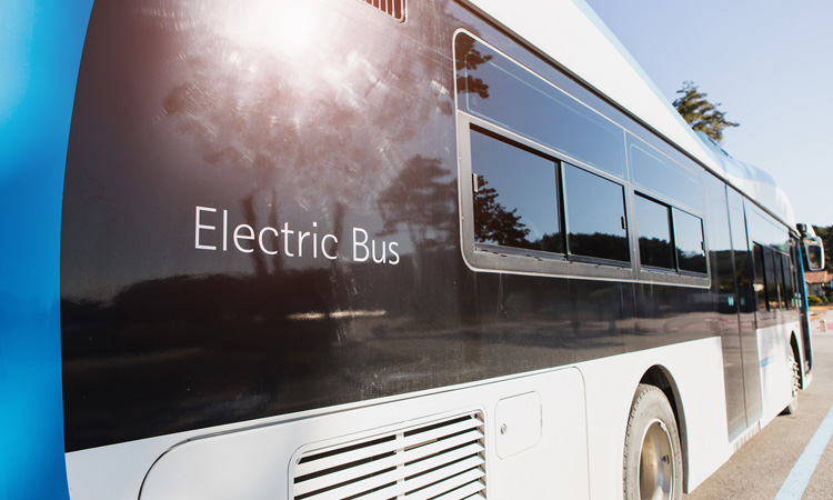 electric bus driving in town